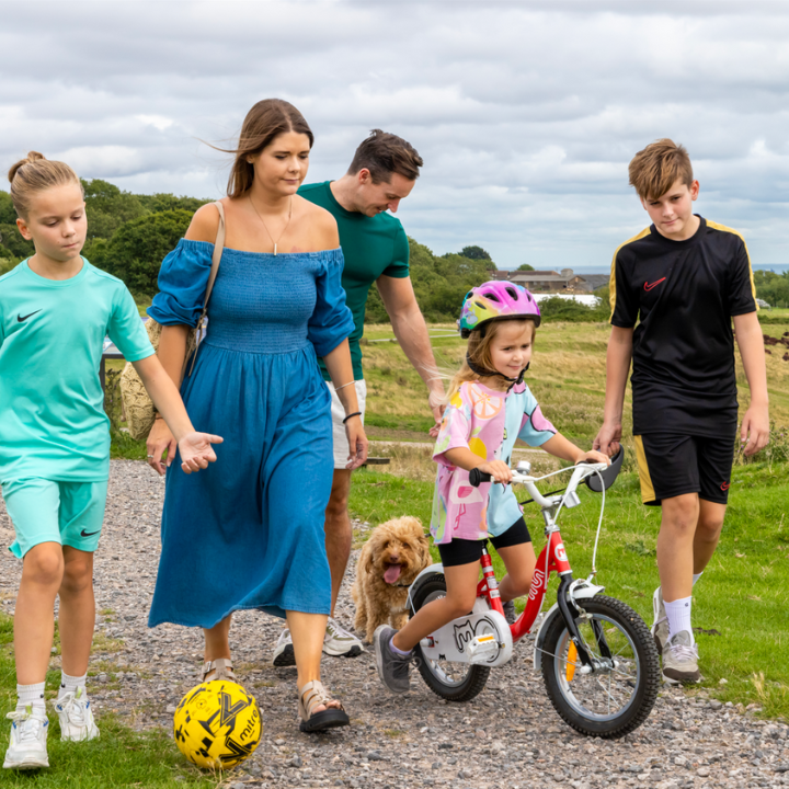 Family getting active in park 1